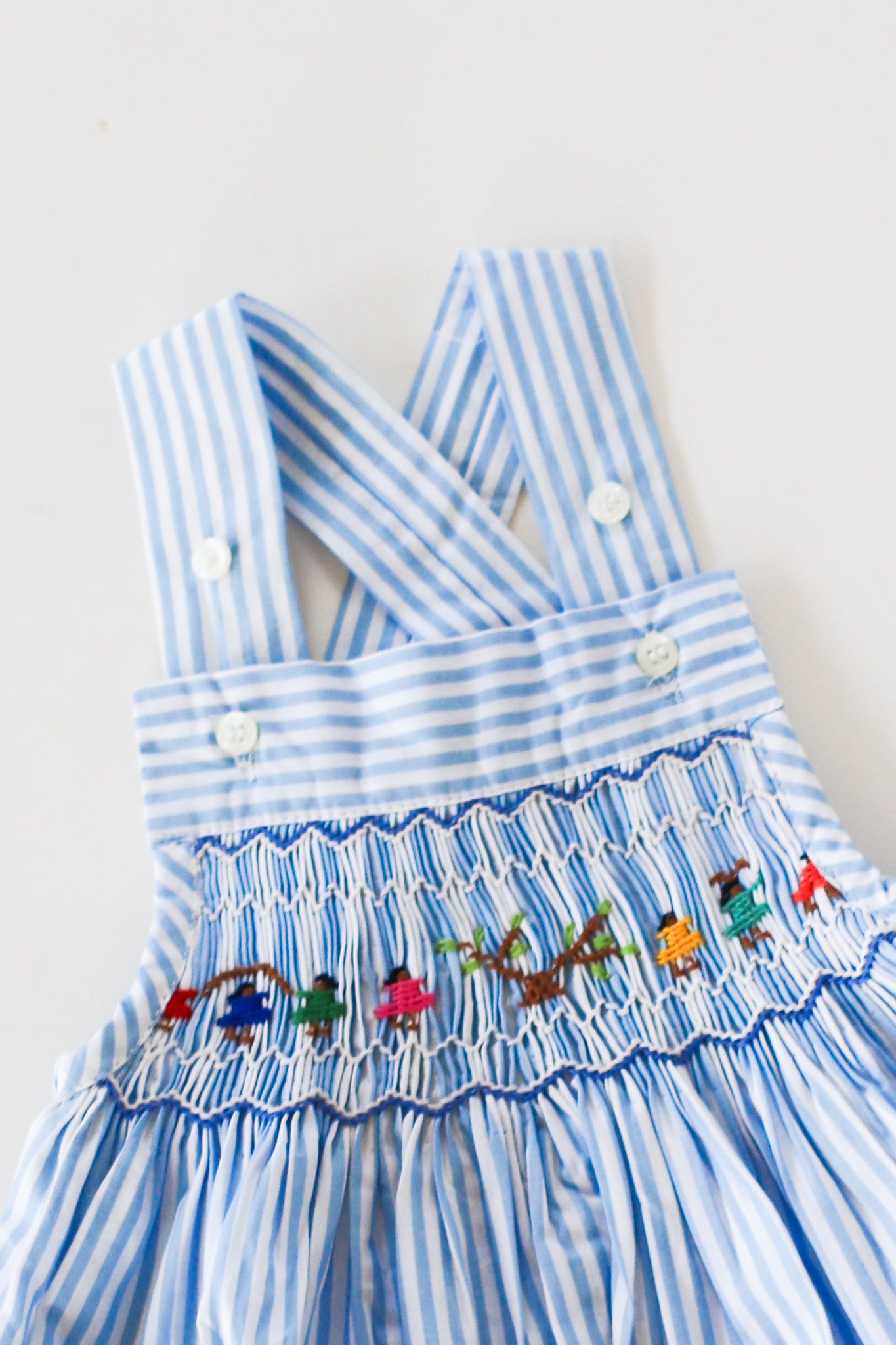 Hand-Smocked Romper Children Playing + Blue and White Stripe