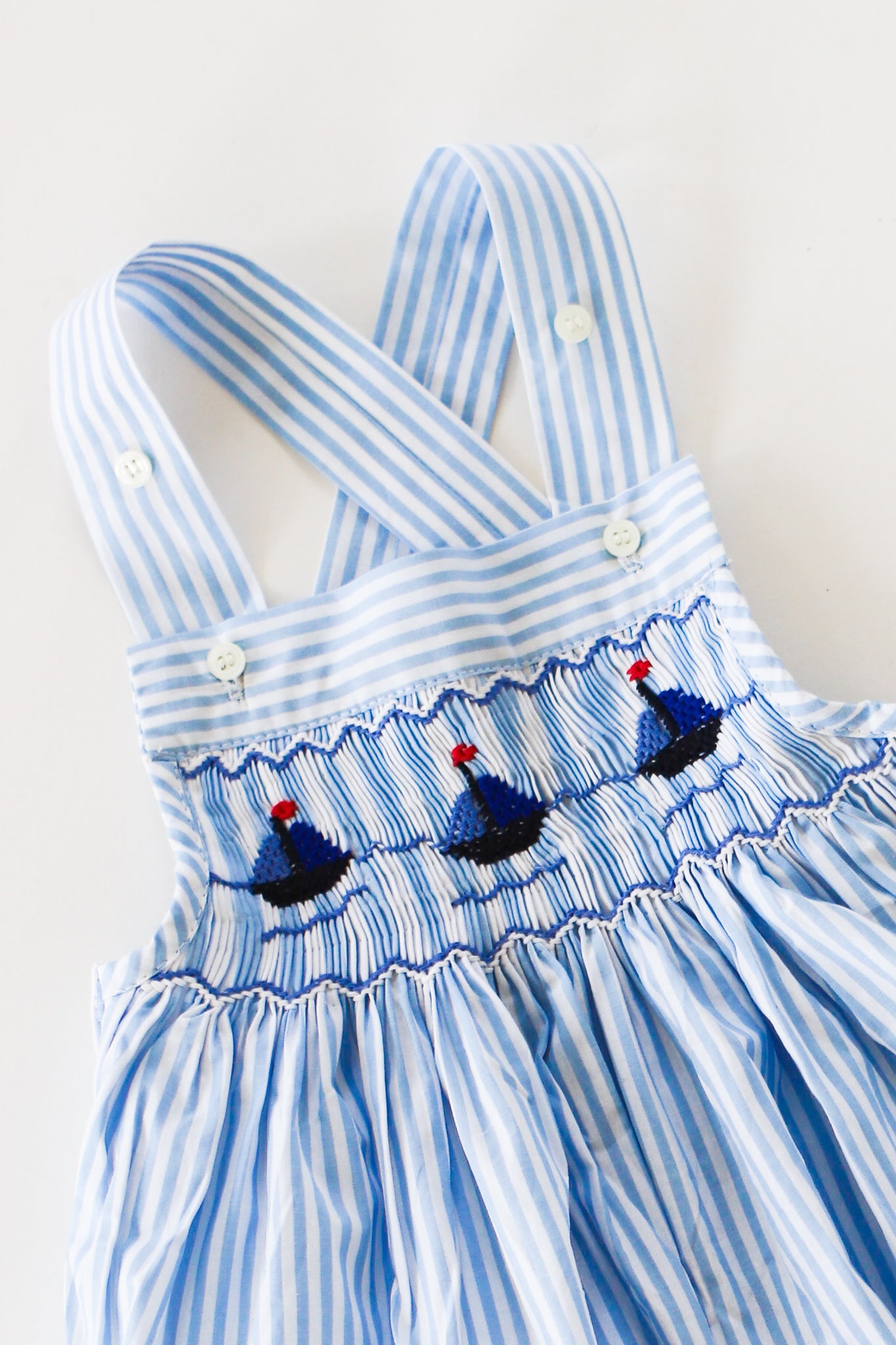 Hand-Smocked Romper Sailboats + Blue and White Stripe