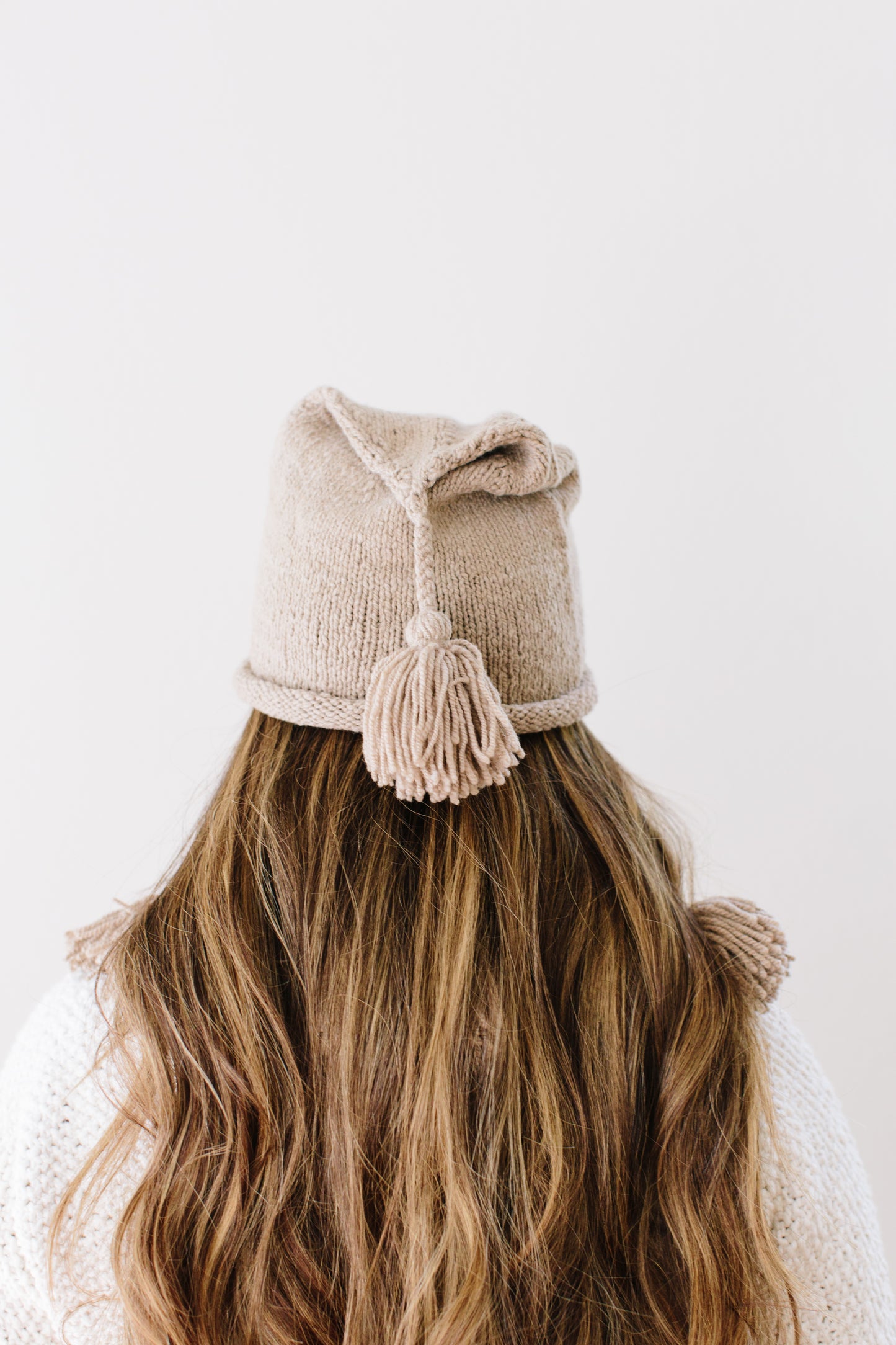 Chantal Tassel Hat in Organic Merino